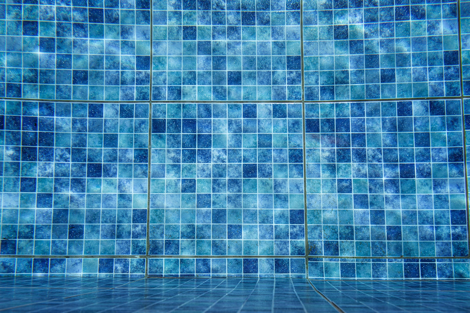 Cleaning Swimming Pool Tiles
